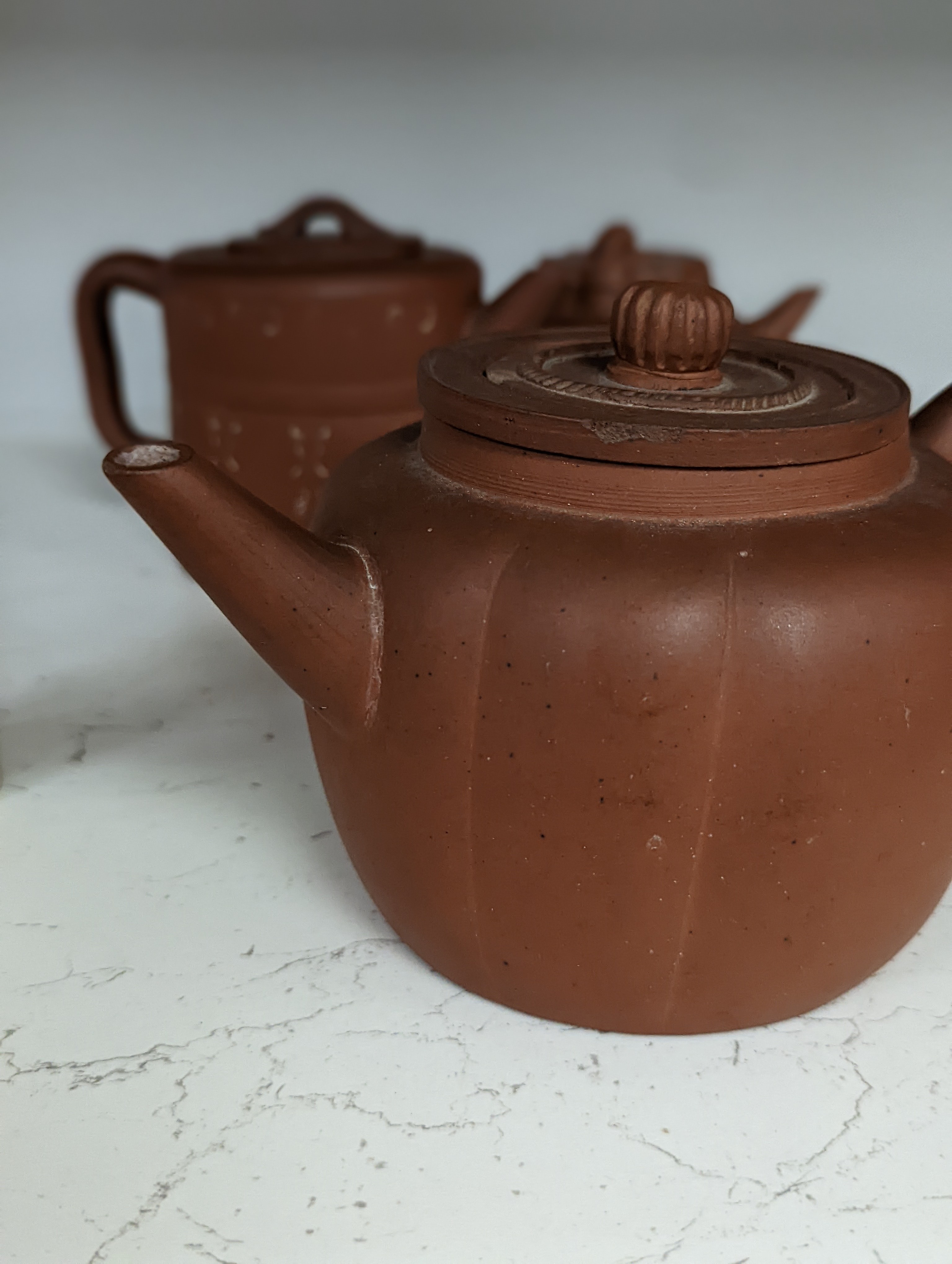 Six Chinese Yixing teapots, tallest 11cm